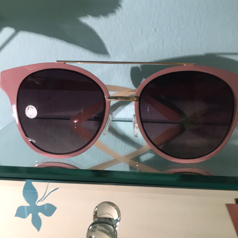 Chic, light pink sunglasses
